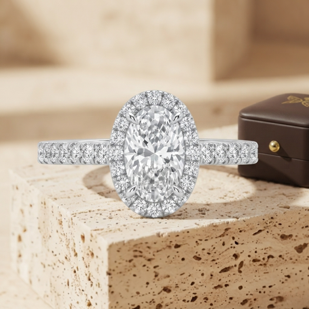 The Luminous Oval Halo Diamond Statement Ring