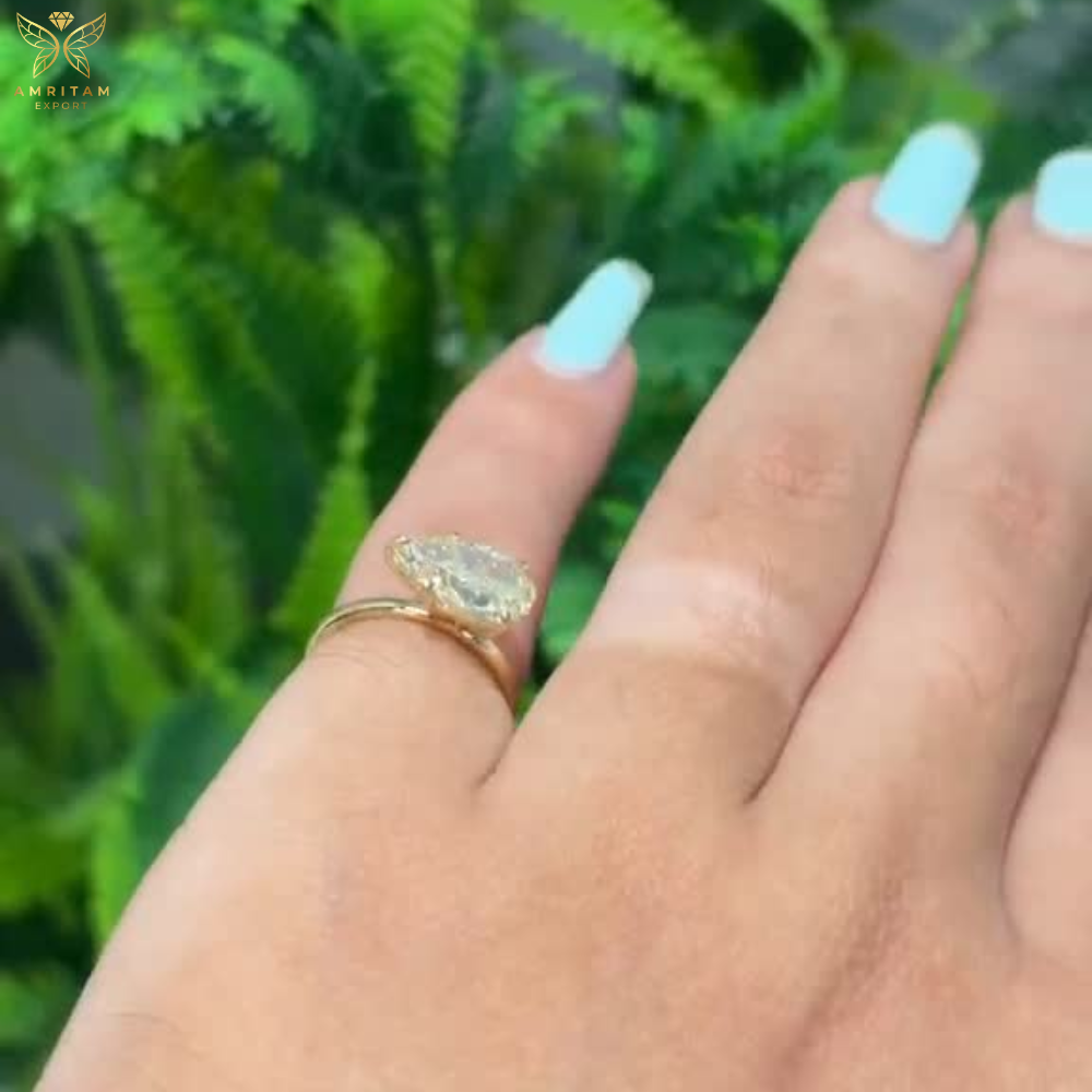 The Luminous East-West Pear Champagne Diamond Solitaire Ring
