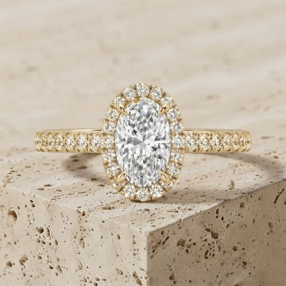 The Luminous Oval Halo Diamond Statement Ring