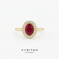 The Luminous Oval Ruby Halo Statement Ring