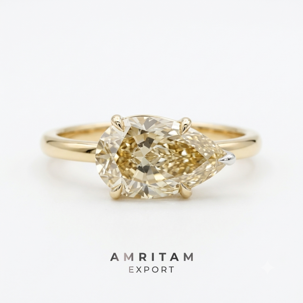 The Luminous East-West Pear Champagne Diamond Solitaire Ring